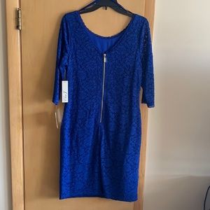 Cocktail dress blue lace with tags.